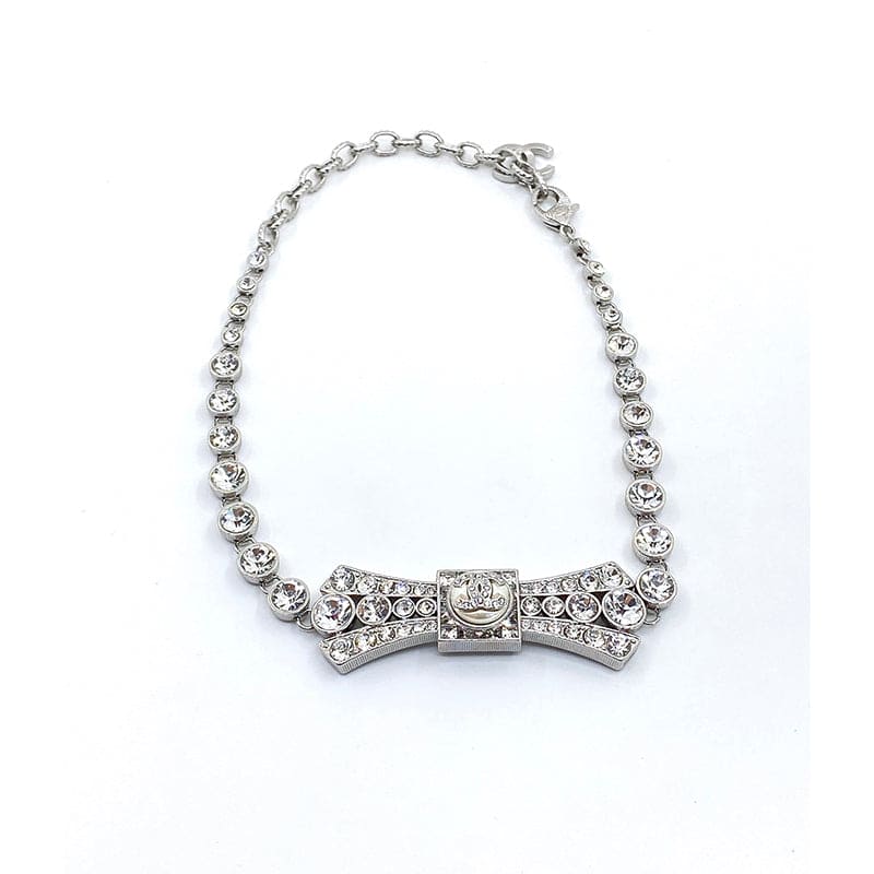 18K Chanel Diamond Bow Tie Pendant Necklace