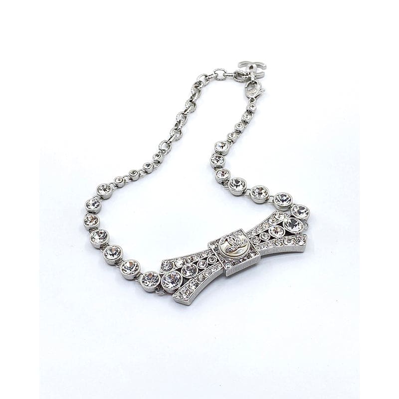 18K Chanel Diamond Bow Tie Pendant Necklace
