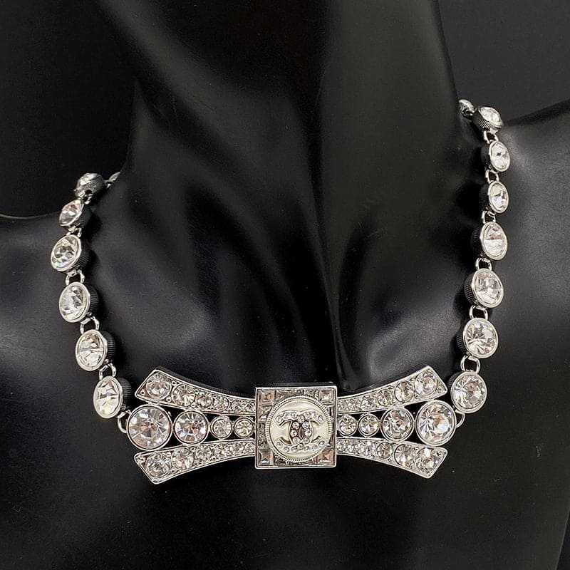 18K Chanel Diamond Bow Tie Pendant Necklace