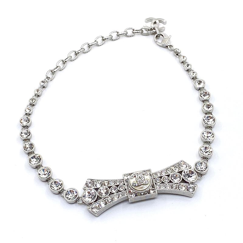 18K Chanel Diamond Bow Tie Pendant Necklace
