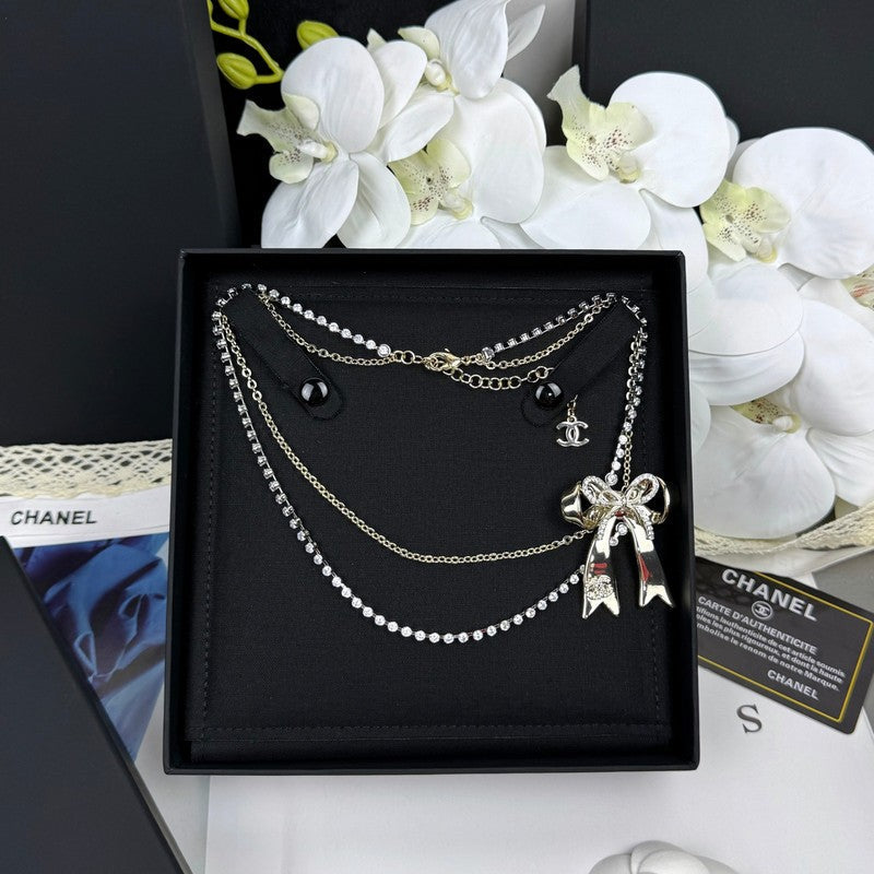 18K Chanel 25K Bow Tie Diamond Gold Necklace